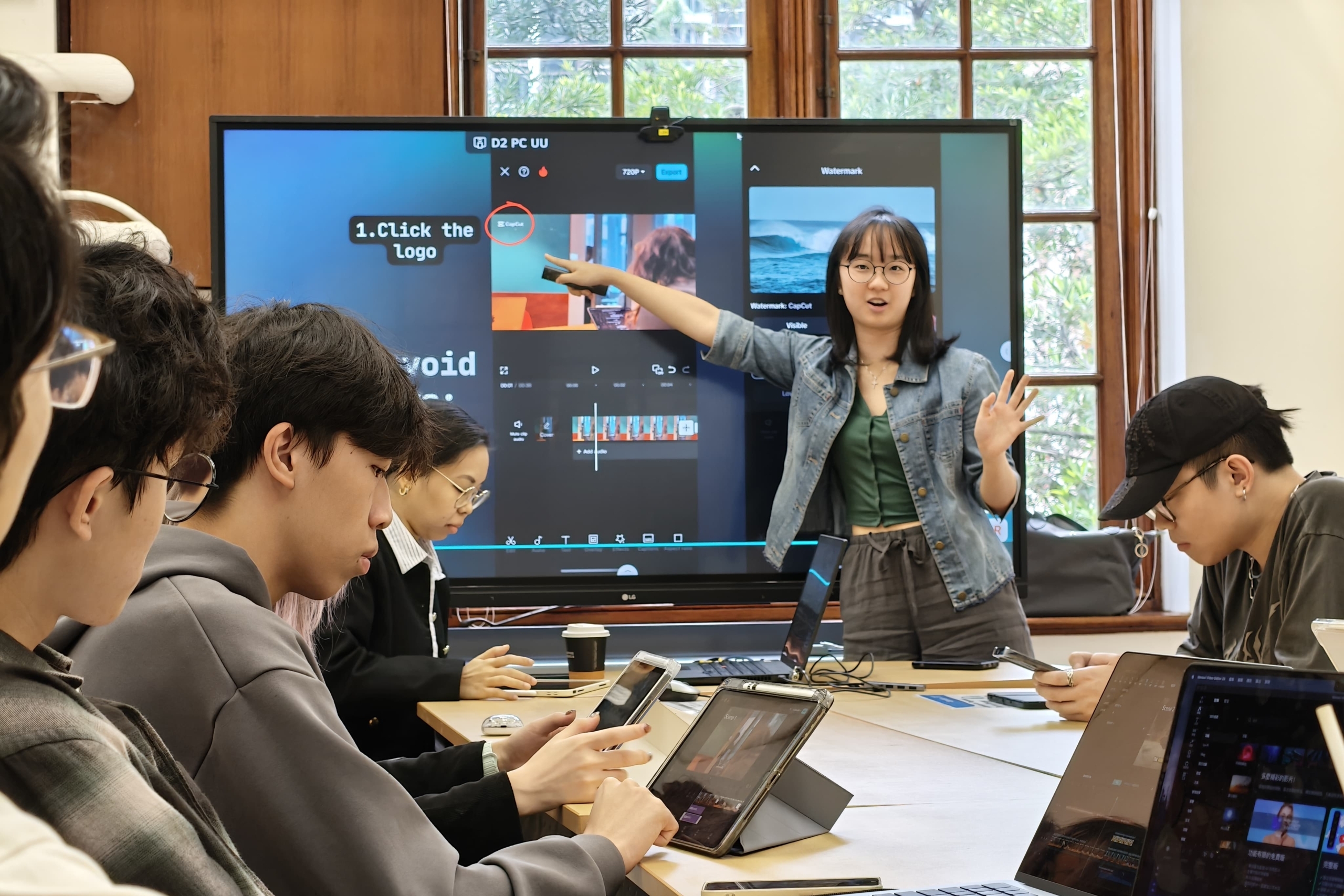 A VADR peer consultant leads a hands-on CapCut video editing workshop with students