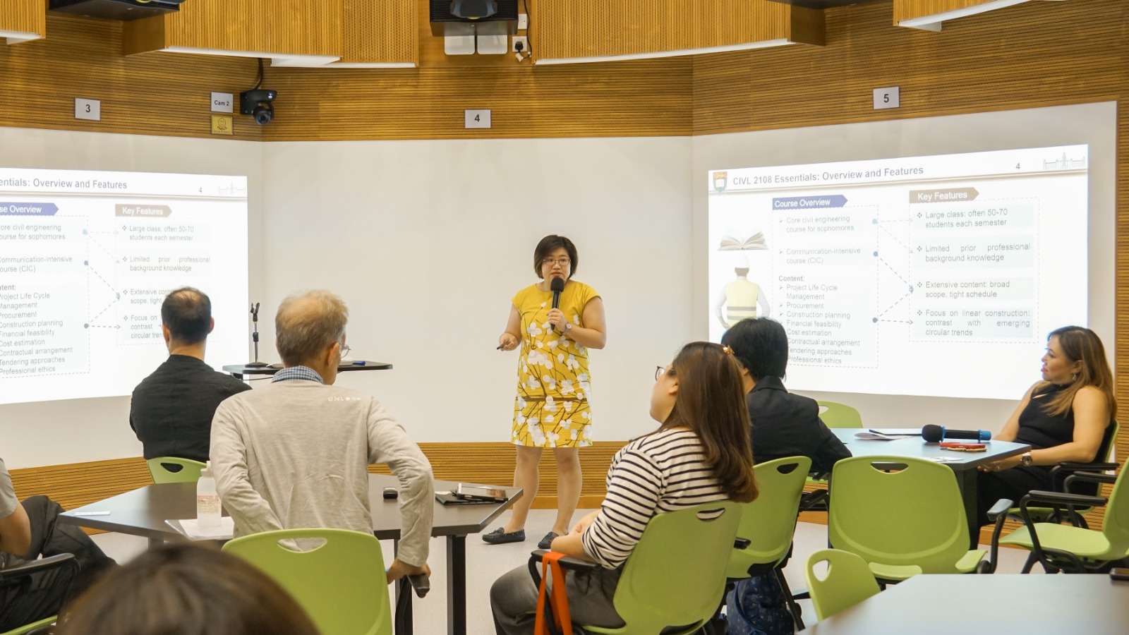 A presenter speaking to a seated audience at a CiC Join-the-Conversation event